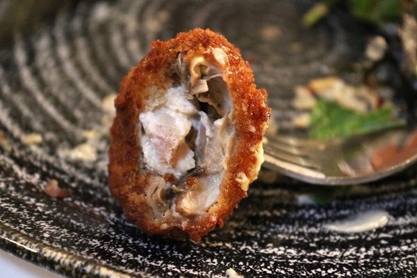 cross section of a fried stuffed mushroom