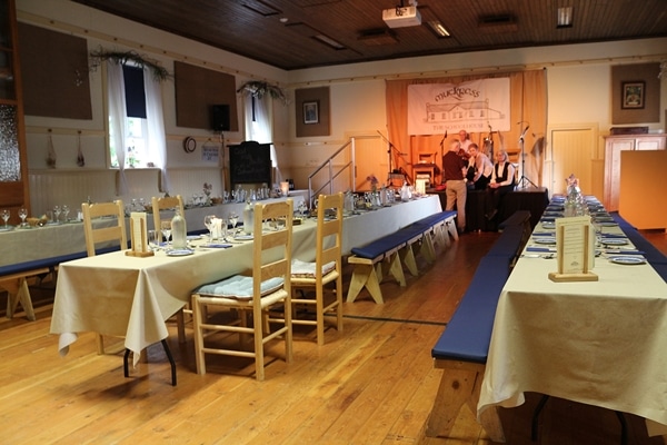 long dining tables in a large room