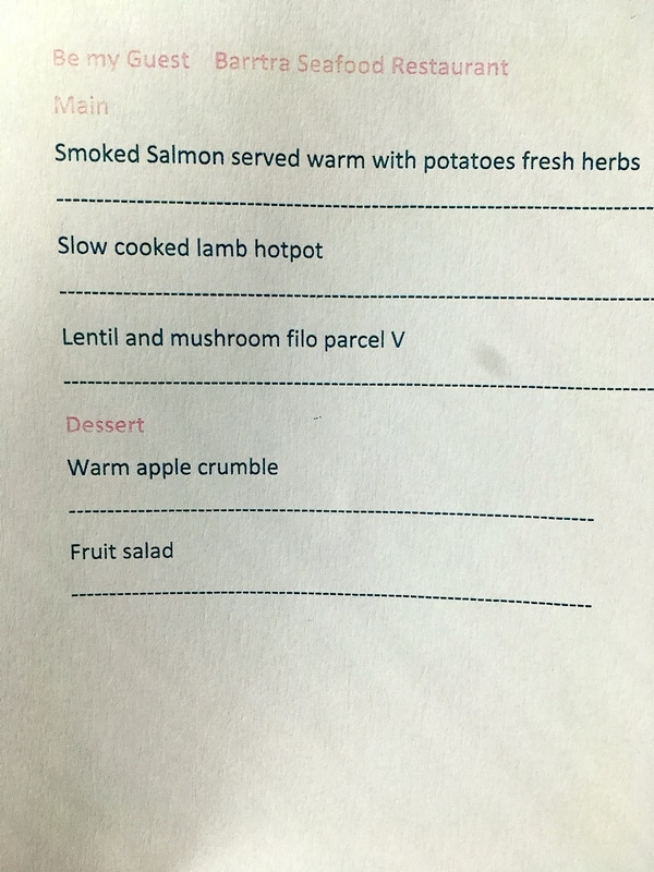 A close up of a food menu