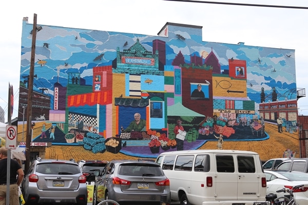 a mural painted on the exterior of a large building