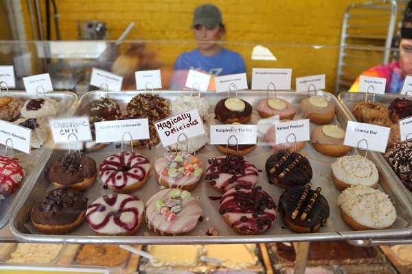 a variety of small donuts for sale