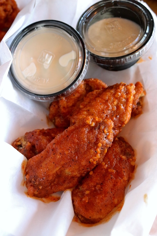 closeup of a basket of chicken wings