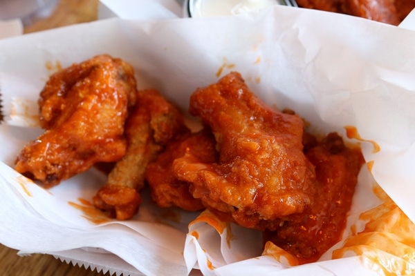 a basket of chicken wings