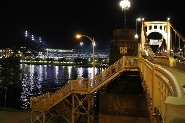 A bridge over a river at night