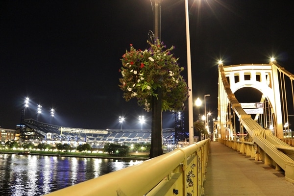 A large bridge lit up at night