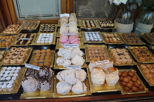 a chocolate and pastry display in a shop