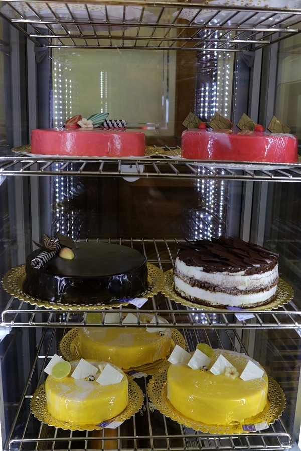 cakes in a bakery display