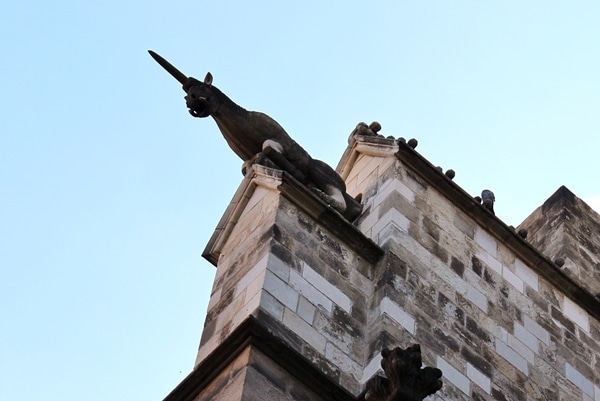 a statue on a stone building