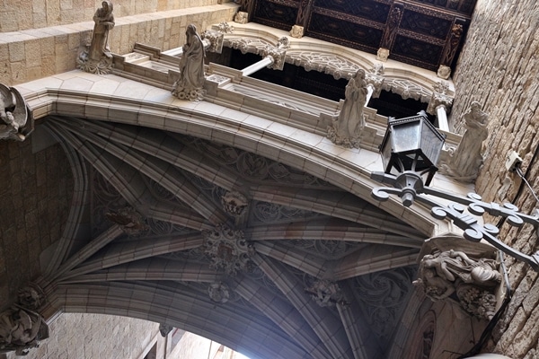 view looking up underneath gothic bridge