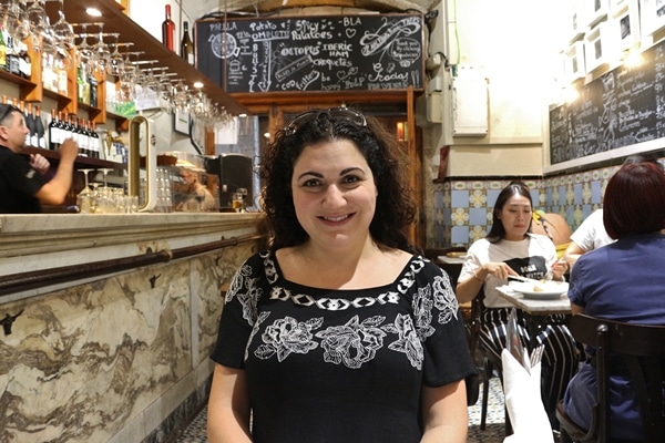 A person sitting at a restaurant table