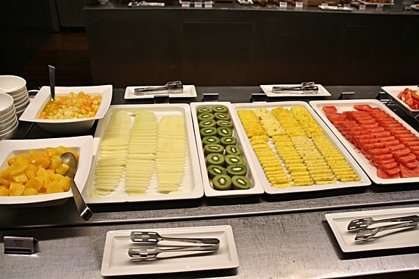 sliced fruits on a breakfast buffet