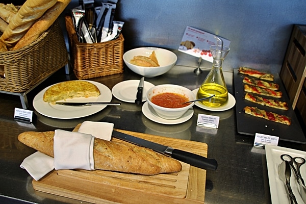 breads and other items on a breakfast buffet