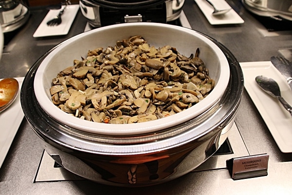 cooked mushrooms on a buffet line