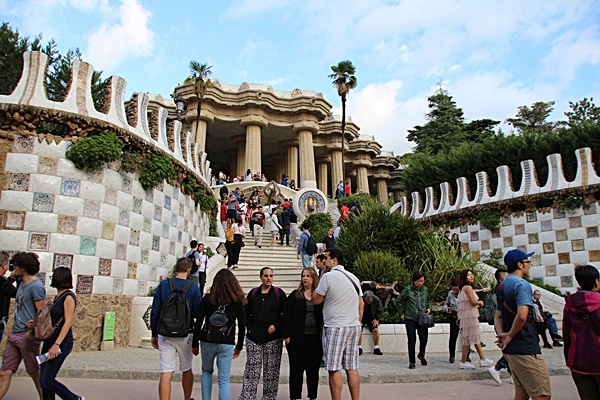 A group of people walking in Park Güell