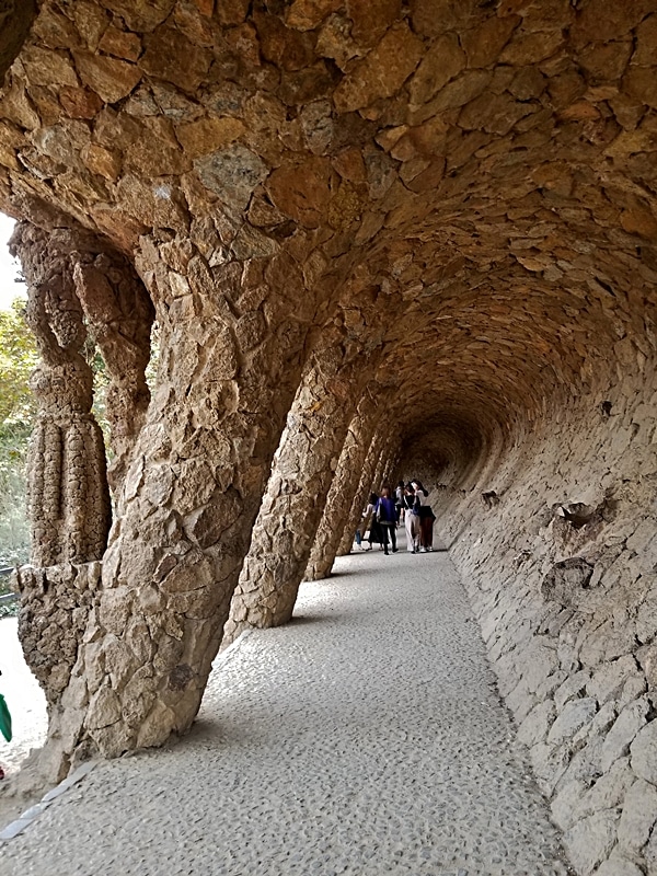 stone columns next to a walkway