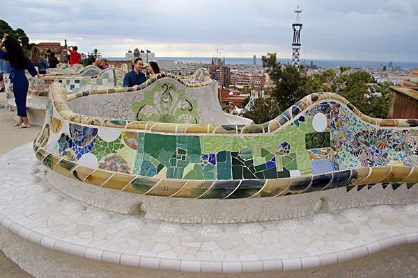 stone benches covered with mosaics in Park Güell