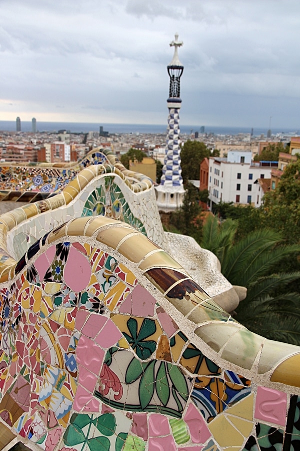 a closeup of mosaic covered benches