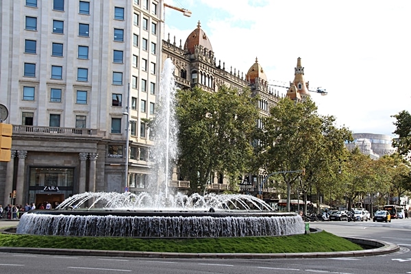 a large fountain on a city street