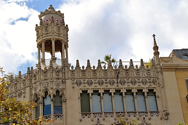 closeup of an ornately carved stone rooftop on a building