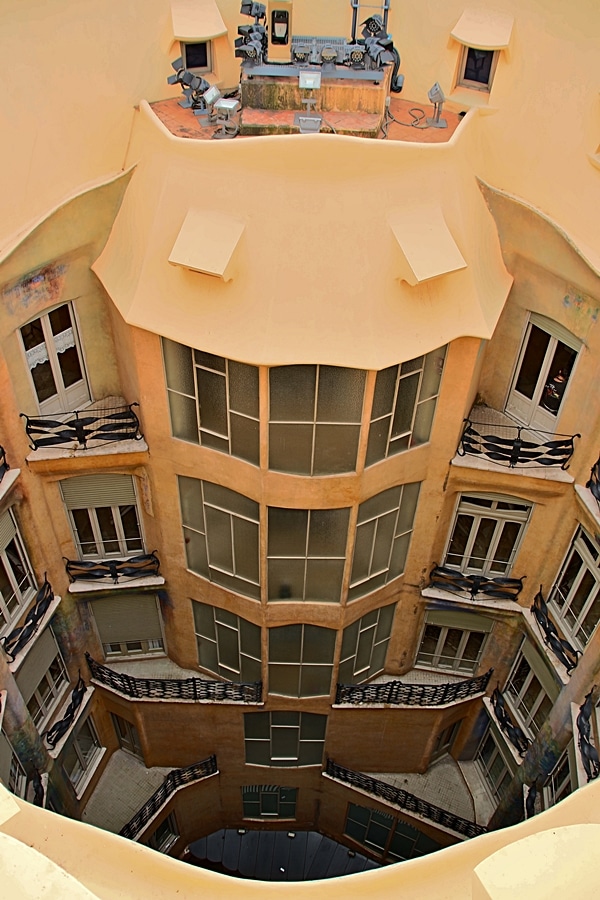 view looking down into a courtyard from the Casa Milà roof