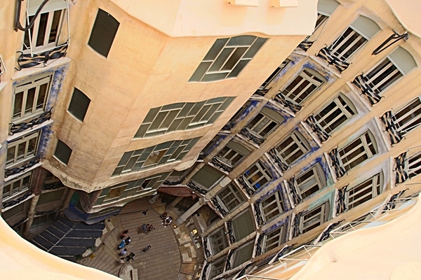 view looking down into a courtyard from the Casa Milà roof