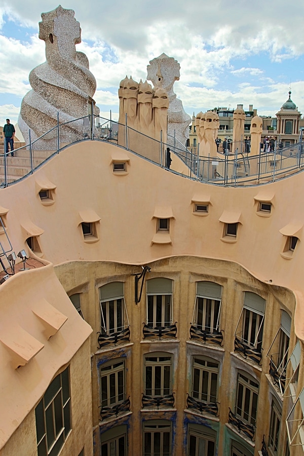 view across the courtyard opening of the Casa Milà rooftop