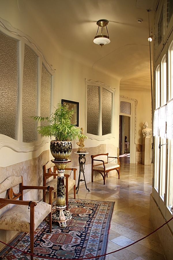 a hallway filled with furniture