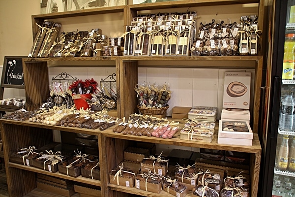 A bunch of chocolates that are on display in a store