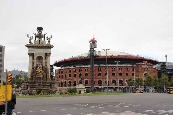 a huge brick arena across a city square