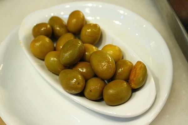 A plate of green olives