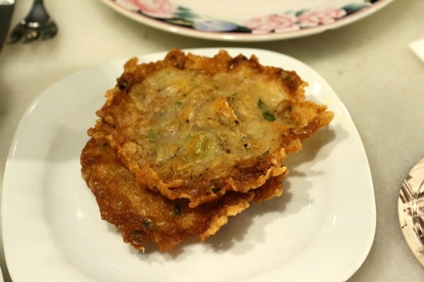 A plate of fried shrimp fritters