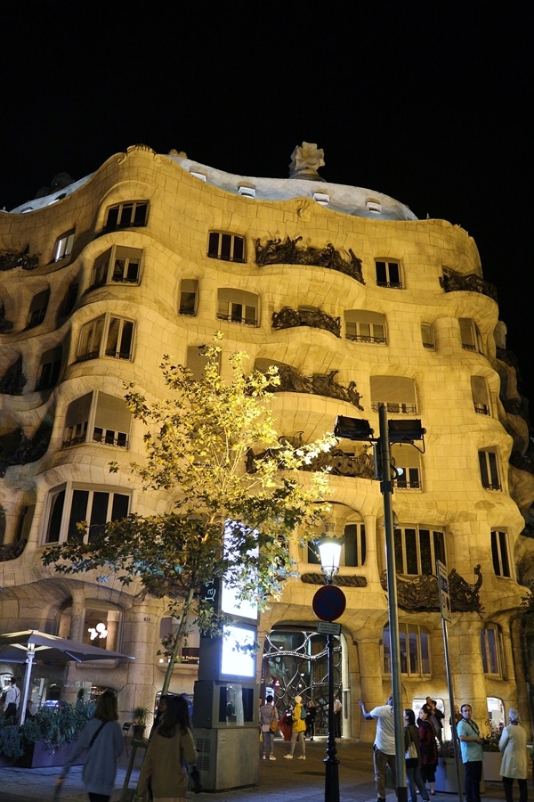 wide view of Casa Milà at night