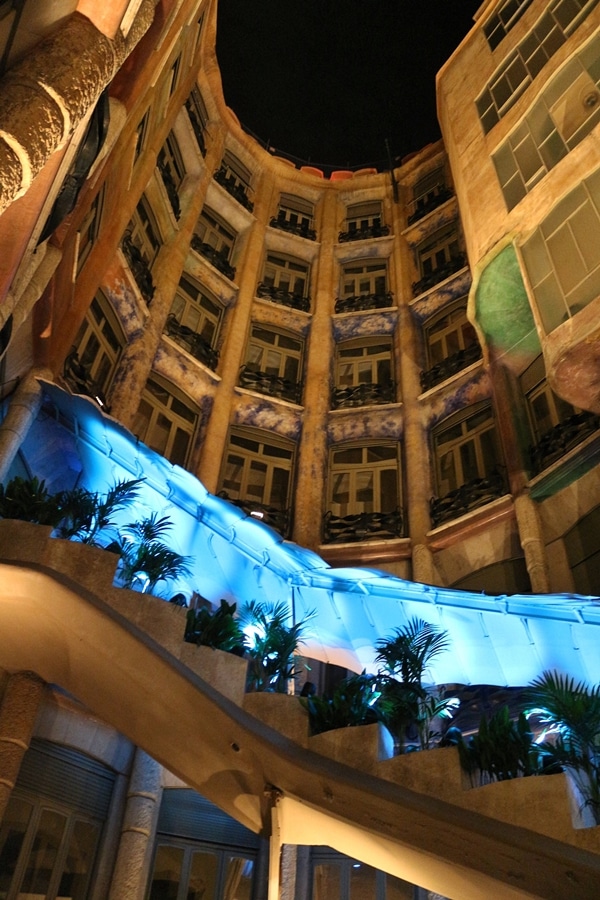 a nighttime view inside an open courtyard