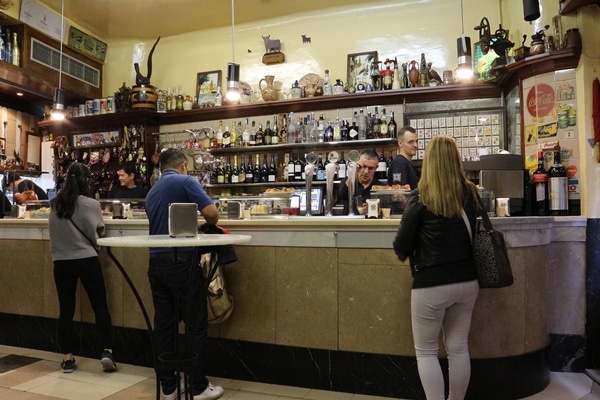 view of the small bar inside a cozy restaurant