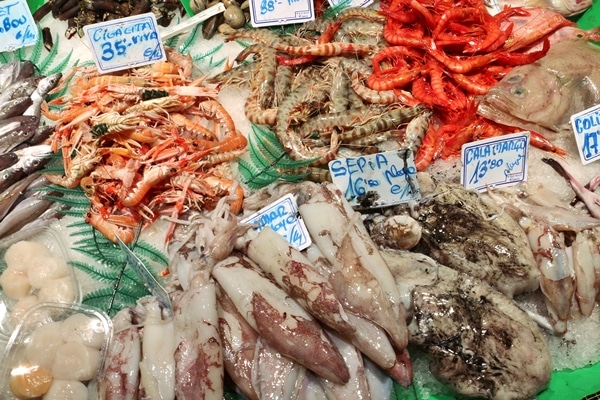 a large seafood display in a food market