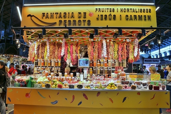 a colorful stall in a food market