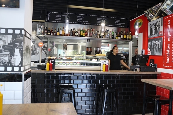 A kitchen with a table in a restaurant