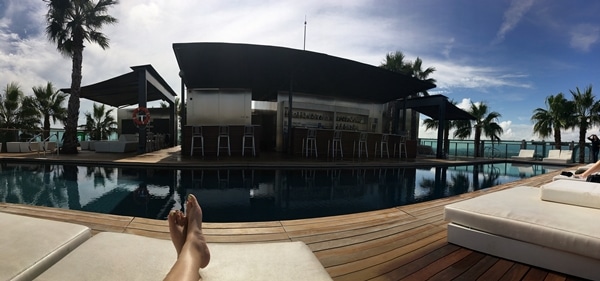 view from a rooftop pool lounge chair