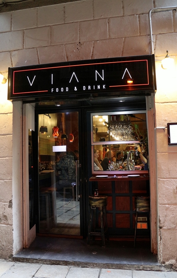 exterior of a restaurant with a sign that says Viana