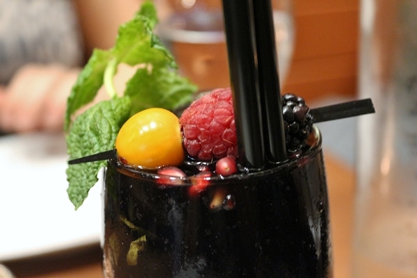 A close up of a blackberry mojito