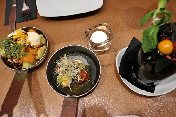 overhead view of food and drinks on a restaurant table