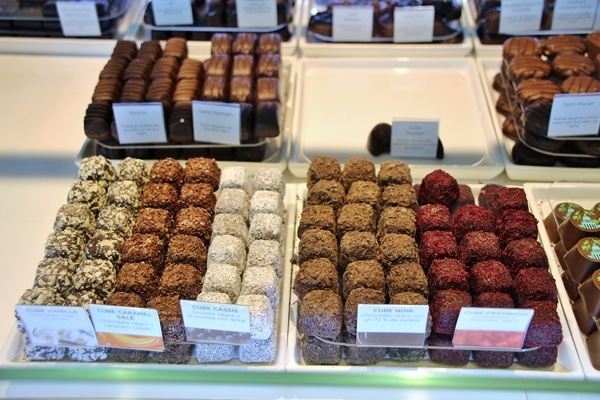 a variety of chocolates in a display case