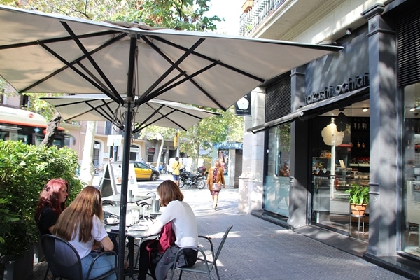 sidewalk seating in front of a cafe