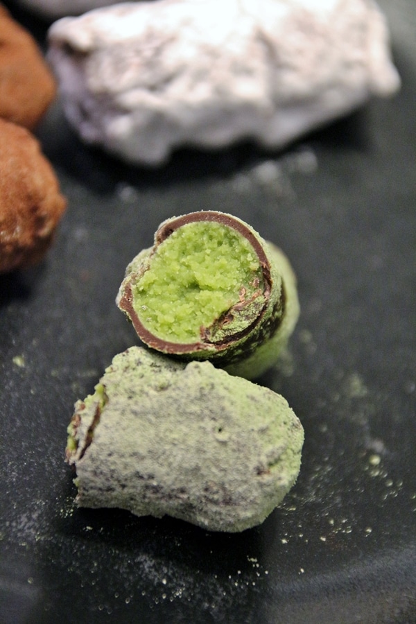 cross section of a chocolate truffle with green filling