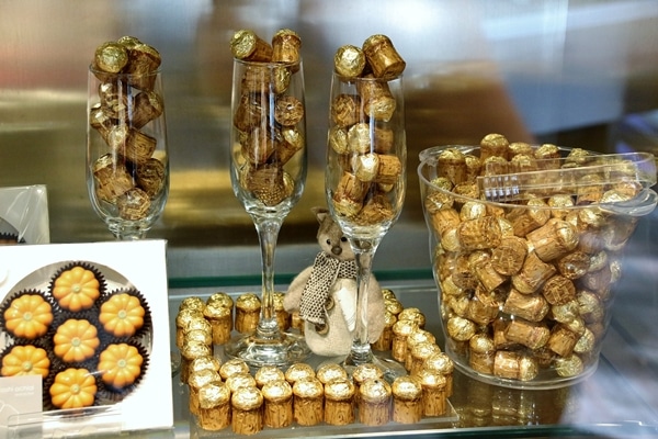 a display of chocolates that resemble Champagne corks