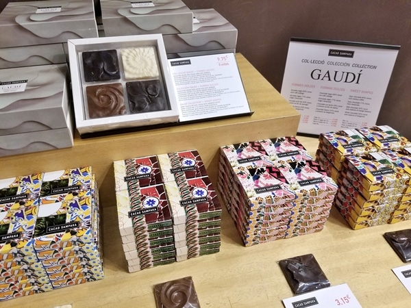 colorful boxes of chocolate for sale on a table display
