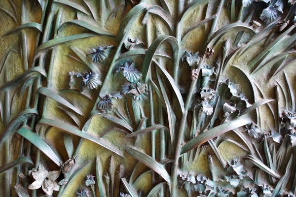 closeup of a carving of plants on a door