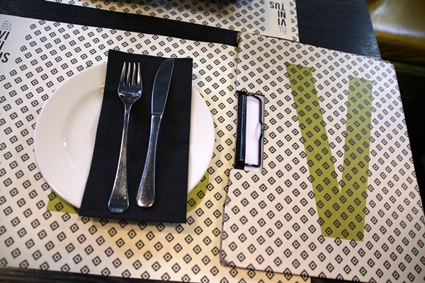 A close up of a table setting in a restaurant