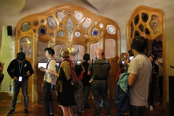 A group of people standing in a room