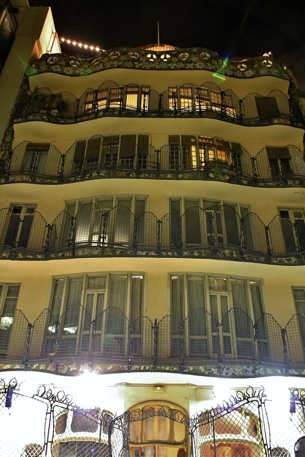 a building with balconies at night